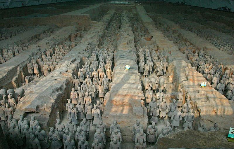 IMG_6493_mod.jpg - The Terracotta Warriors.  This is why we went to China.  Back in February 2009, we saw the Terracotta Warrior exhibit here in Atlanta, and decided we had to see the real thing.  Each one has a different face, and each face probably represents one of the people who created them 2000 plus years ago.  This is Pit One.  Light is streaming in from windows in the ceiling.