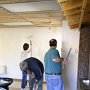 After a filling lunch of tacos  across the street, we start laying down paint.