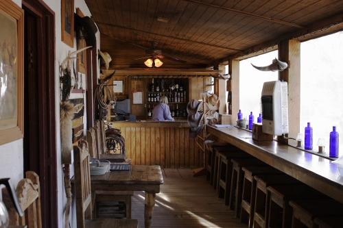 CRW_3695.JPG - The view of the enclosed front porch of the ranch house.