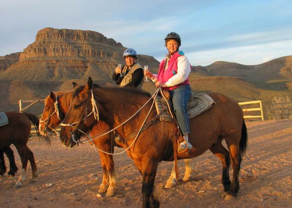 master_1862.jpg - Toasting our ride with Champagne. Are our horses - Hutch and Partner - taking a nap?